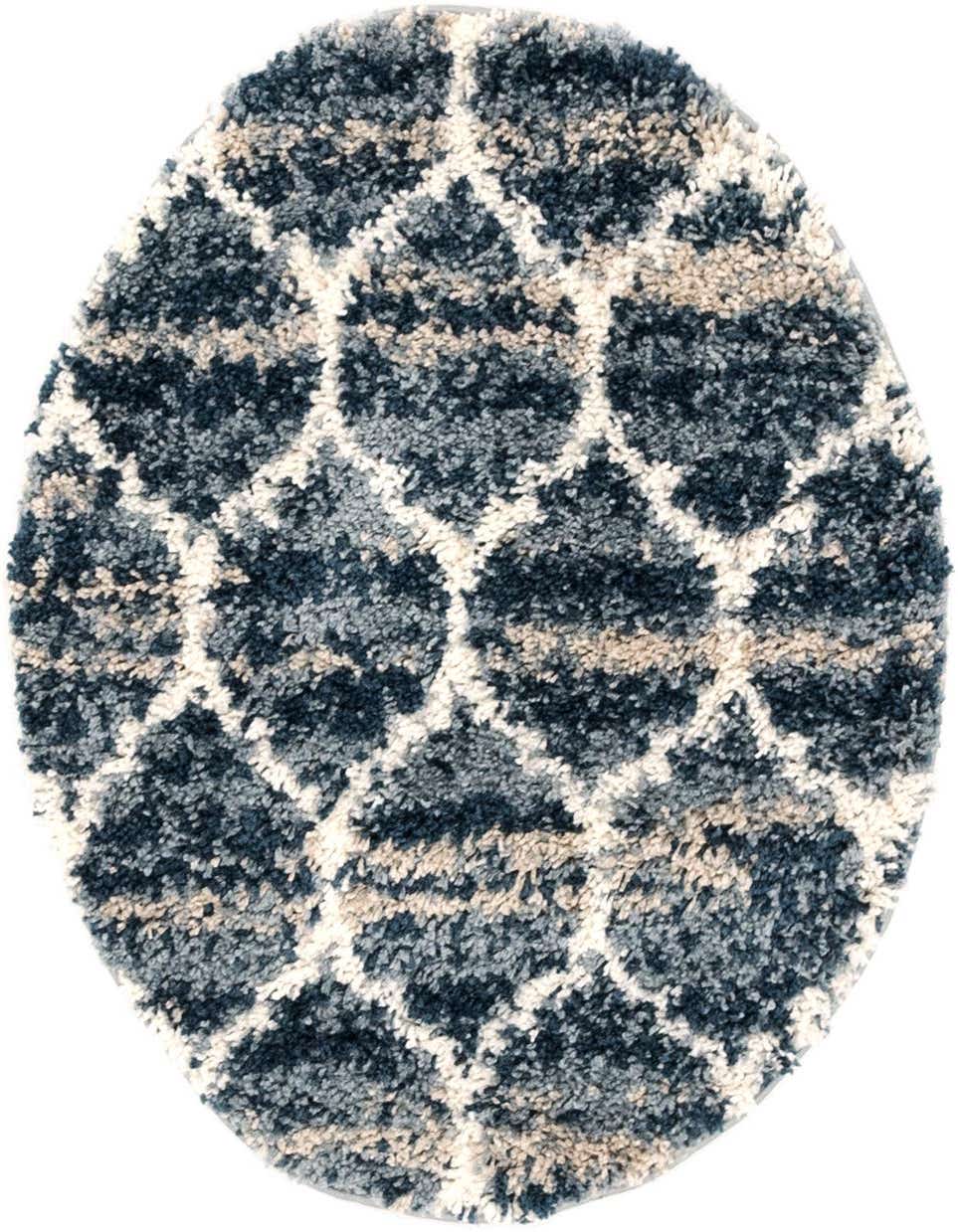 A round, blue and cream shag rug with a modern geometric trellis pattern, ideal for a cozy living space.