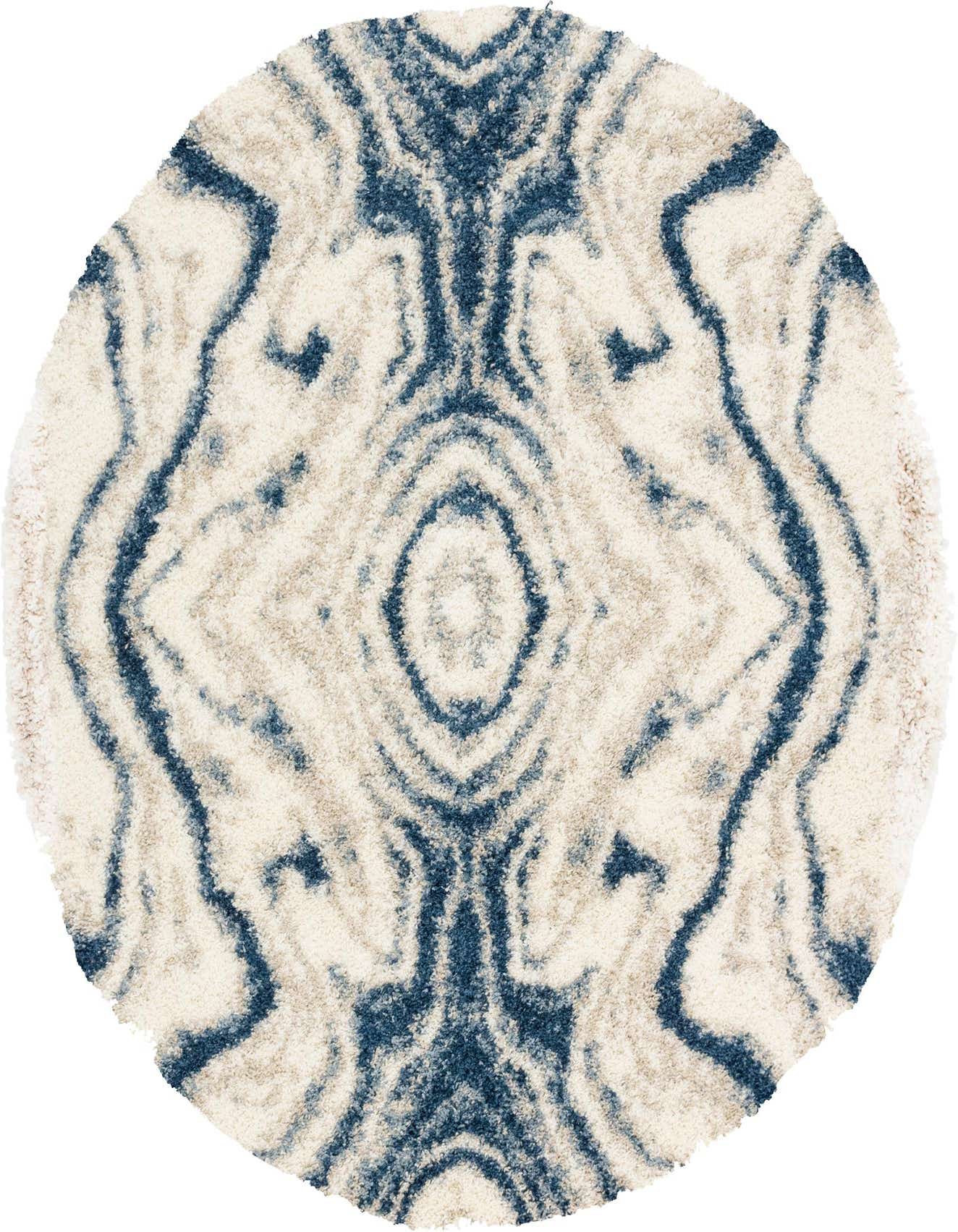 A round blue and off-white shag rug featuring a symmetrical, abstract coastal pattern, offering a plush texture.