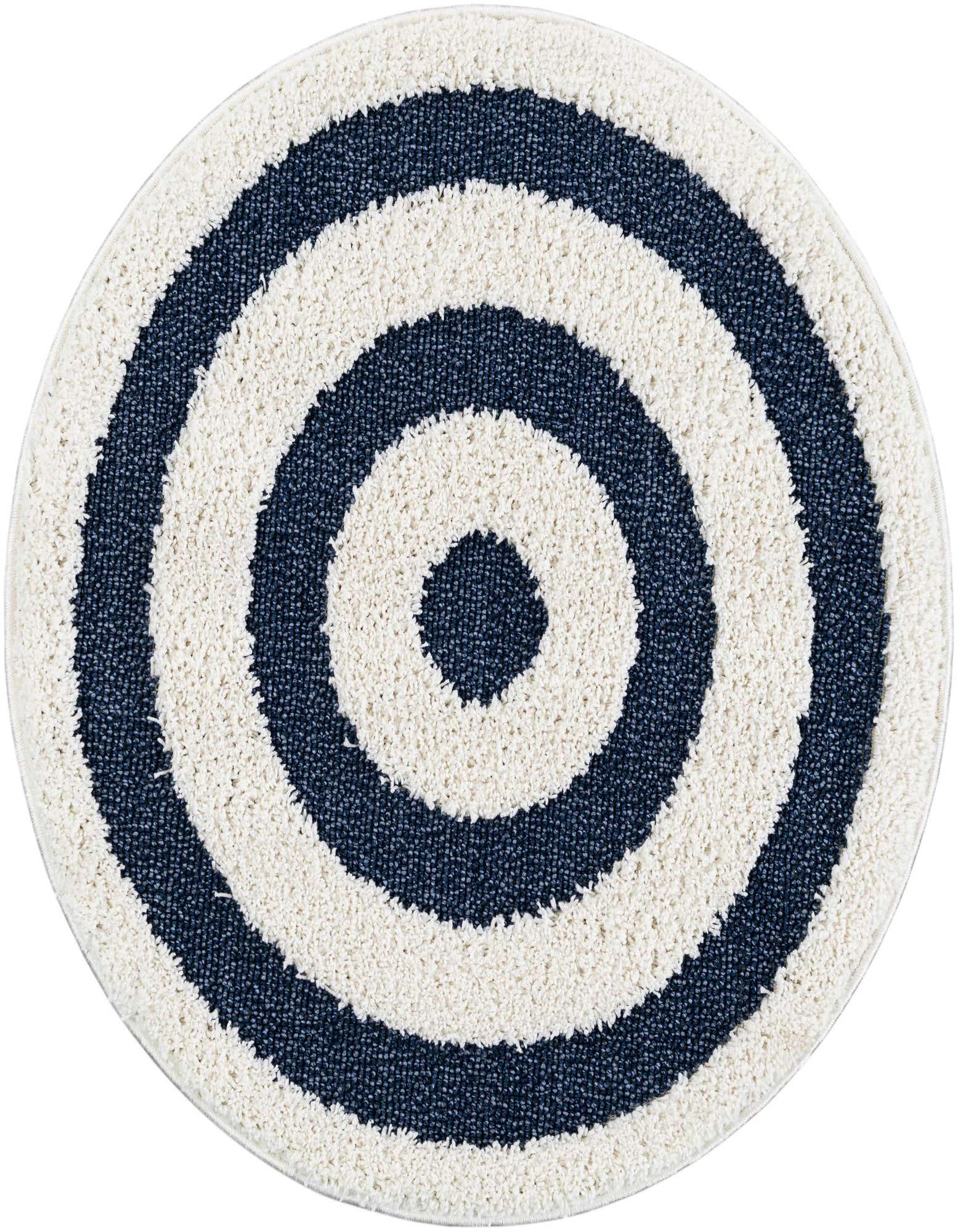 A 3' 3 round blue and white striped rug with a modern target pattern, featuring a textured high pile.