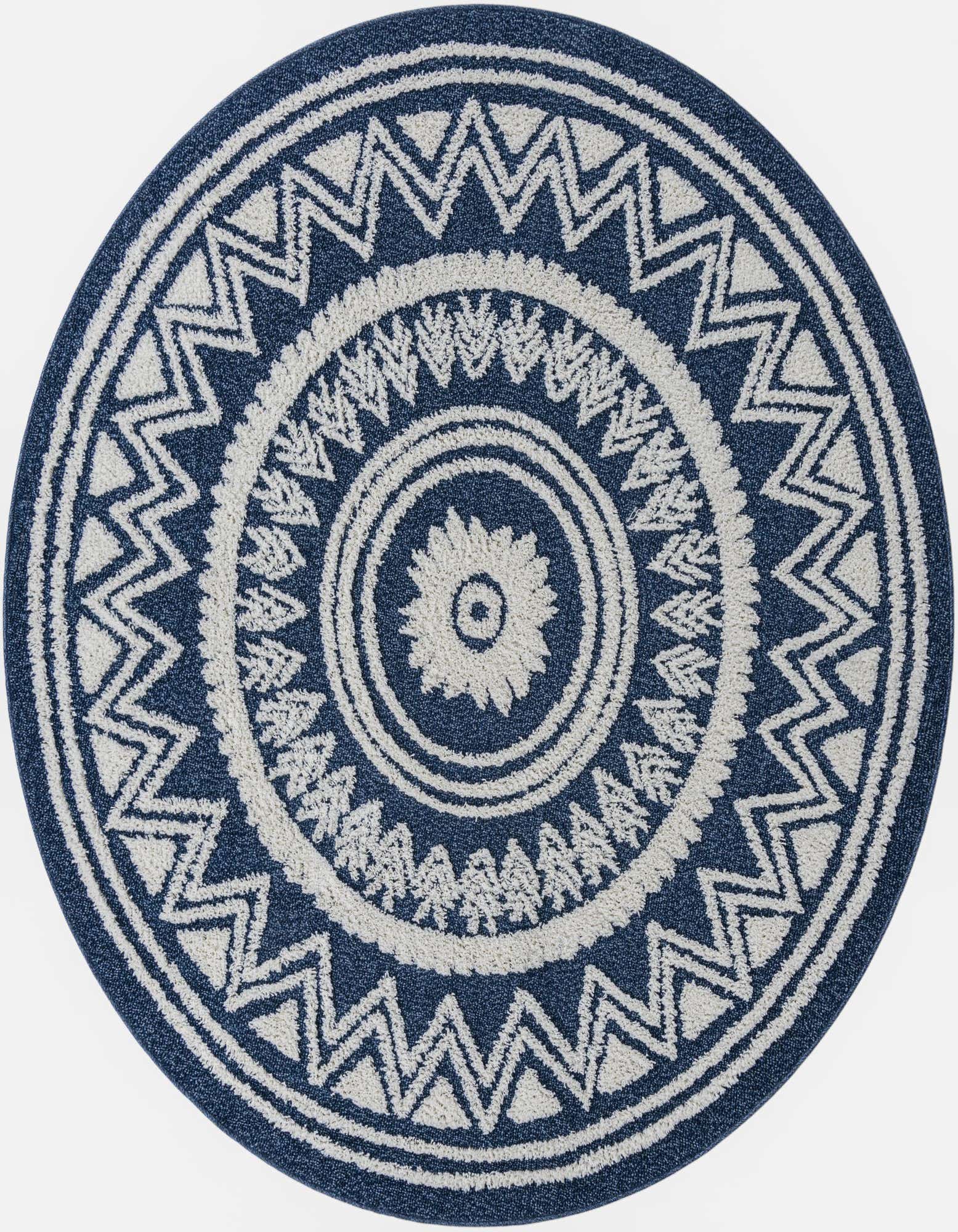 A 7' 10 round blue and white Southwestern rug with a central medallion and tribal patterns.