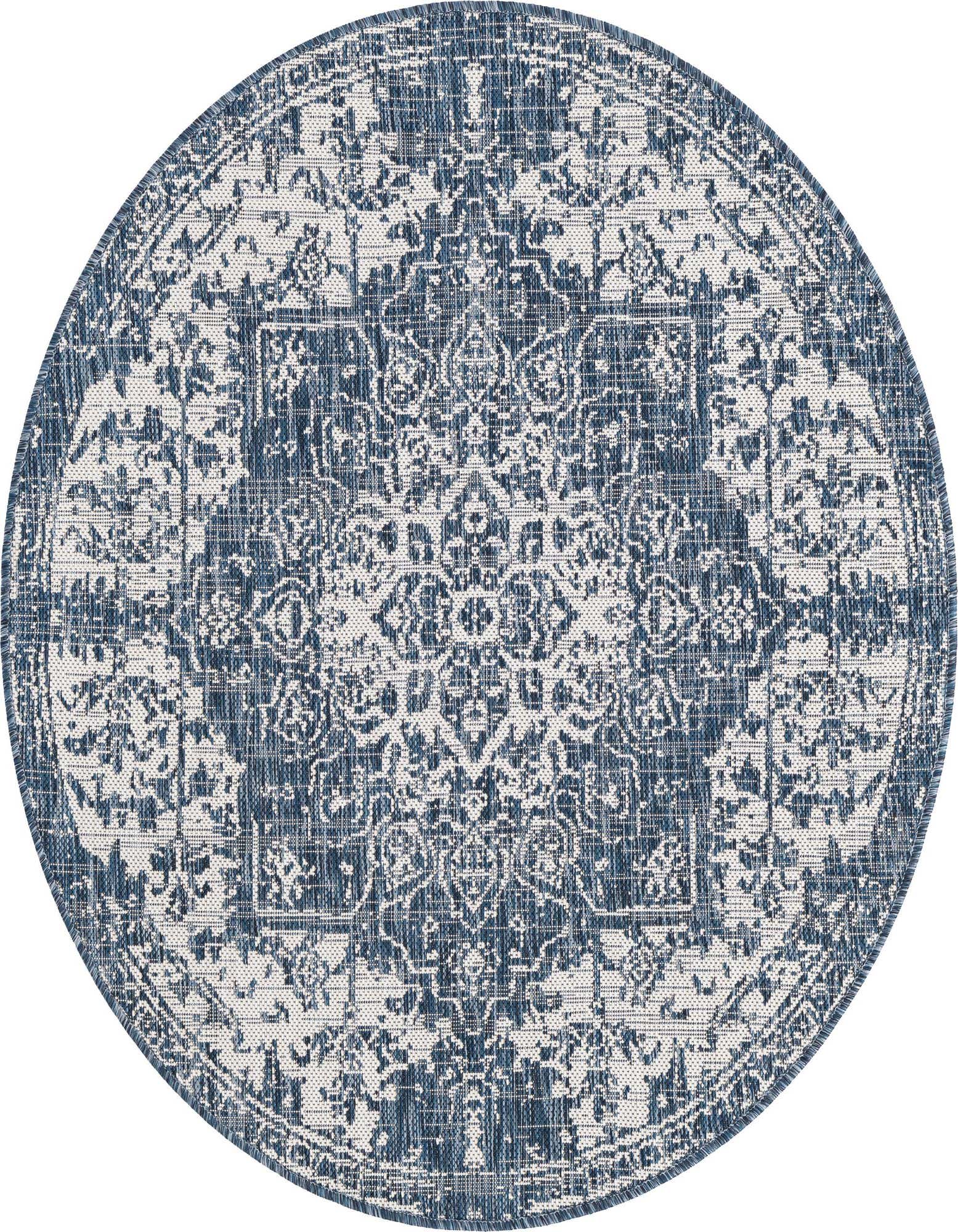 A 4' round blue and white Mediterranean medallion rug with a textured flatweave, suitable for indoor or outdoor use.