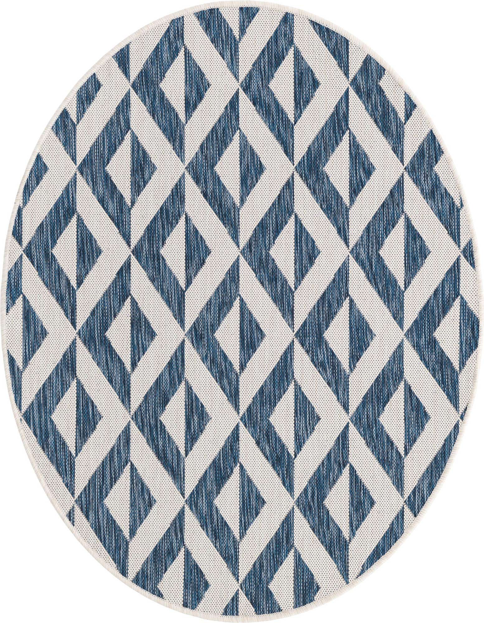 A 4' round blue and white geometric trellis rug, suitable for indoor or outdoor use on a patio.