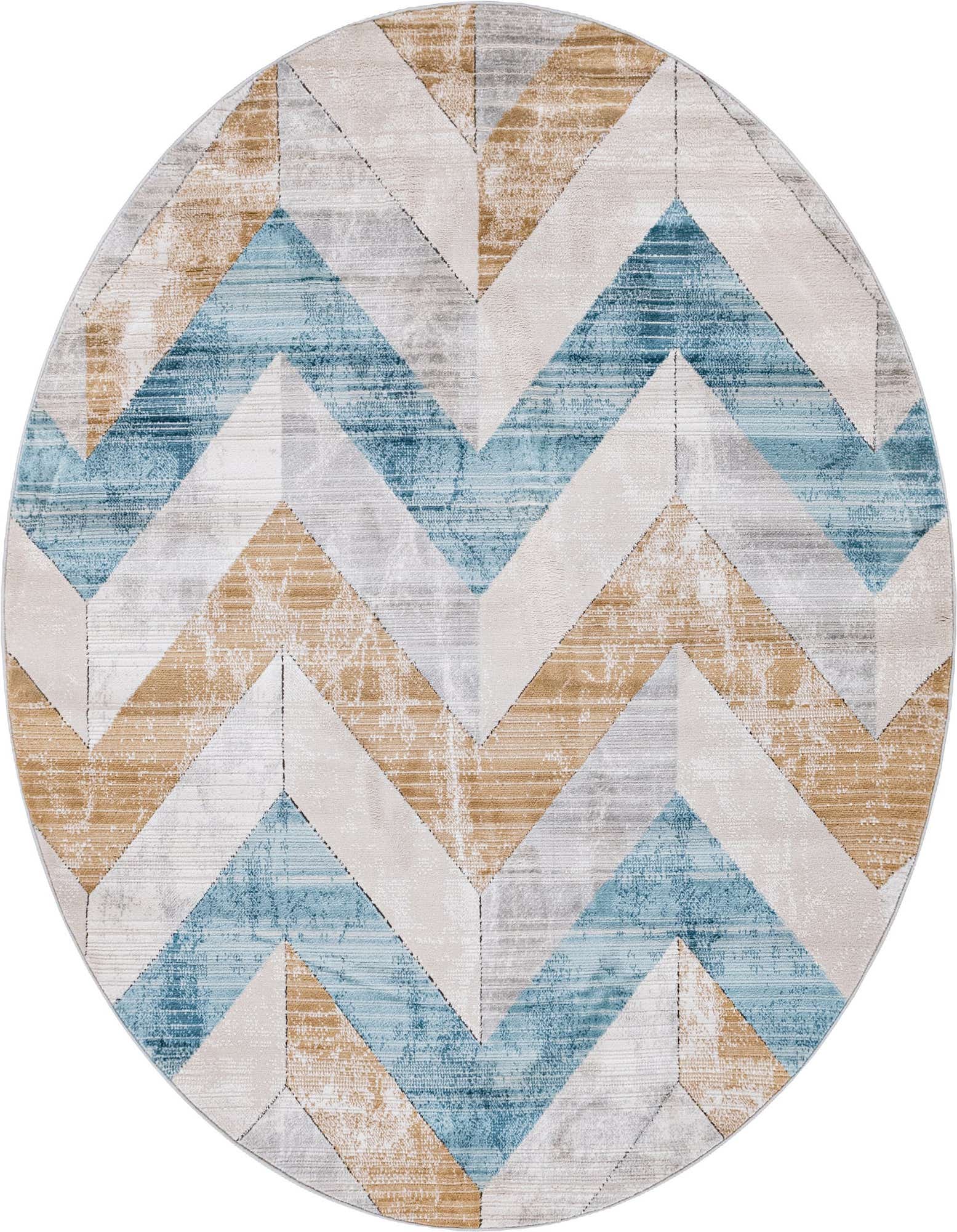 A round rug featuring a dynamic chevron pattern in varying shades of blue, beige, and gray, with a textured, distressed look.