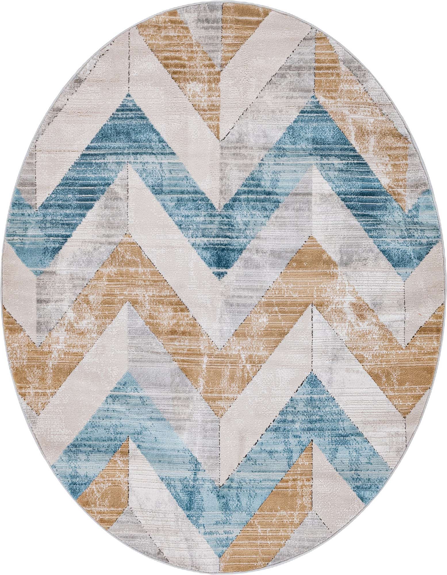 A 6' round rug featuring a modern geometric chevron pattern in shades of blue, tan, and gray.