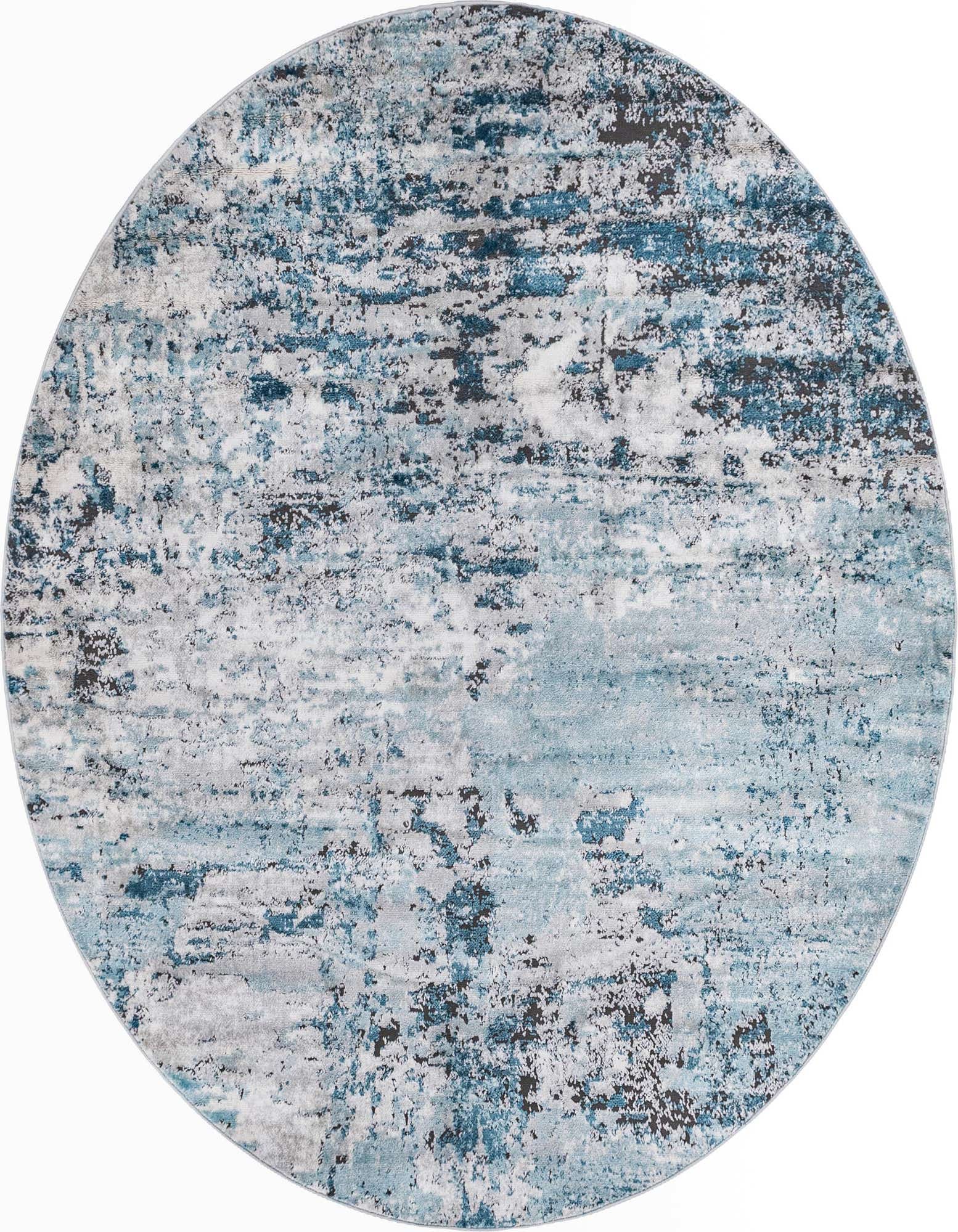 A 7' round blue abstract area rug with mottled light and dark blue, gray, and white tones, creating a textured, modern look.