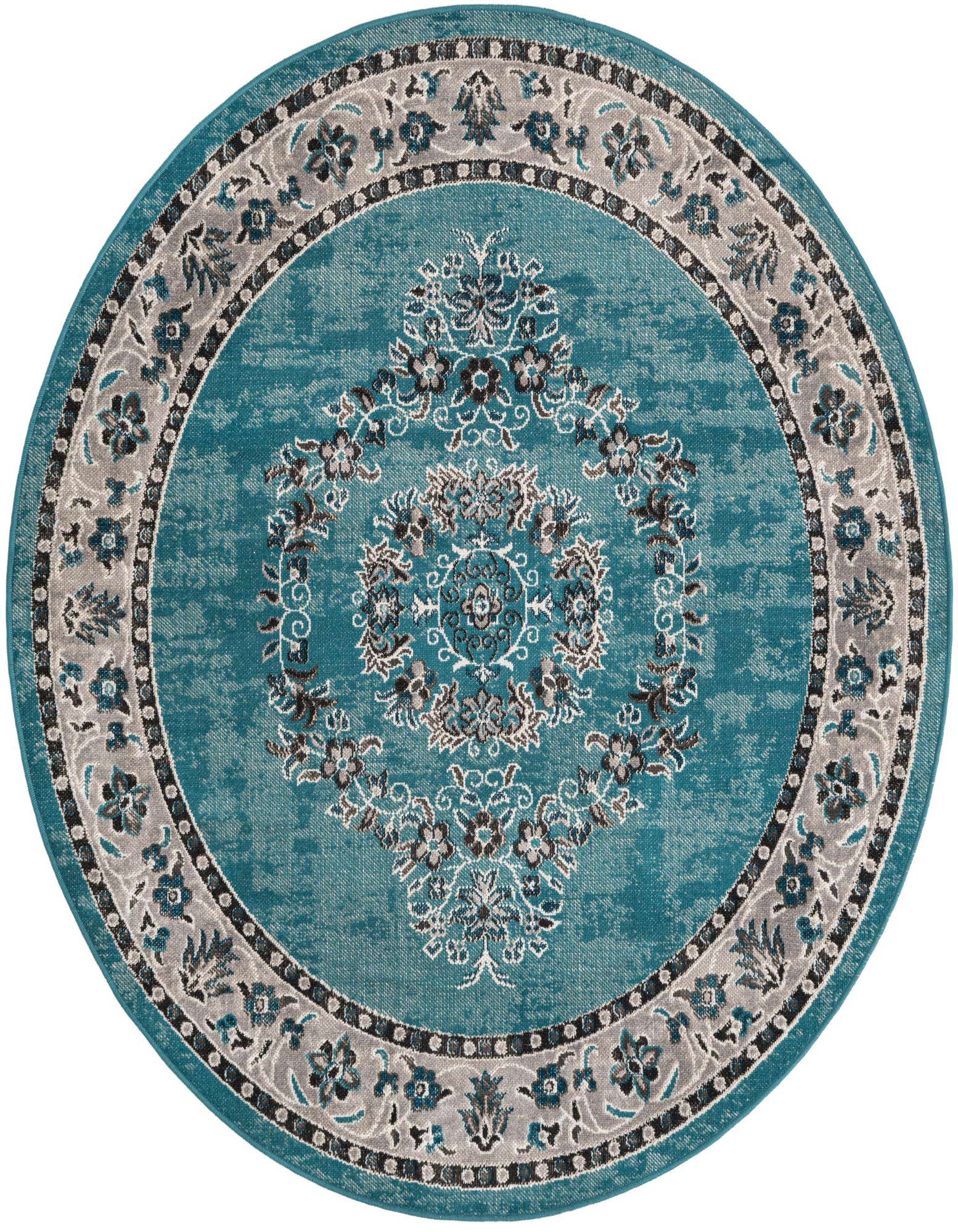A 5' 3 round blue rug with a distressed traditional medallion and botanical pattern in grey, black, and white.