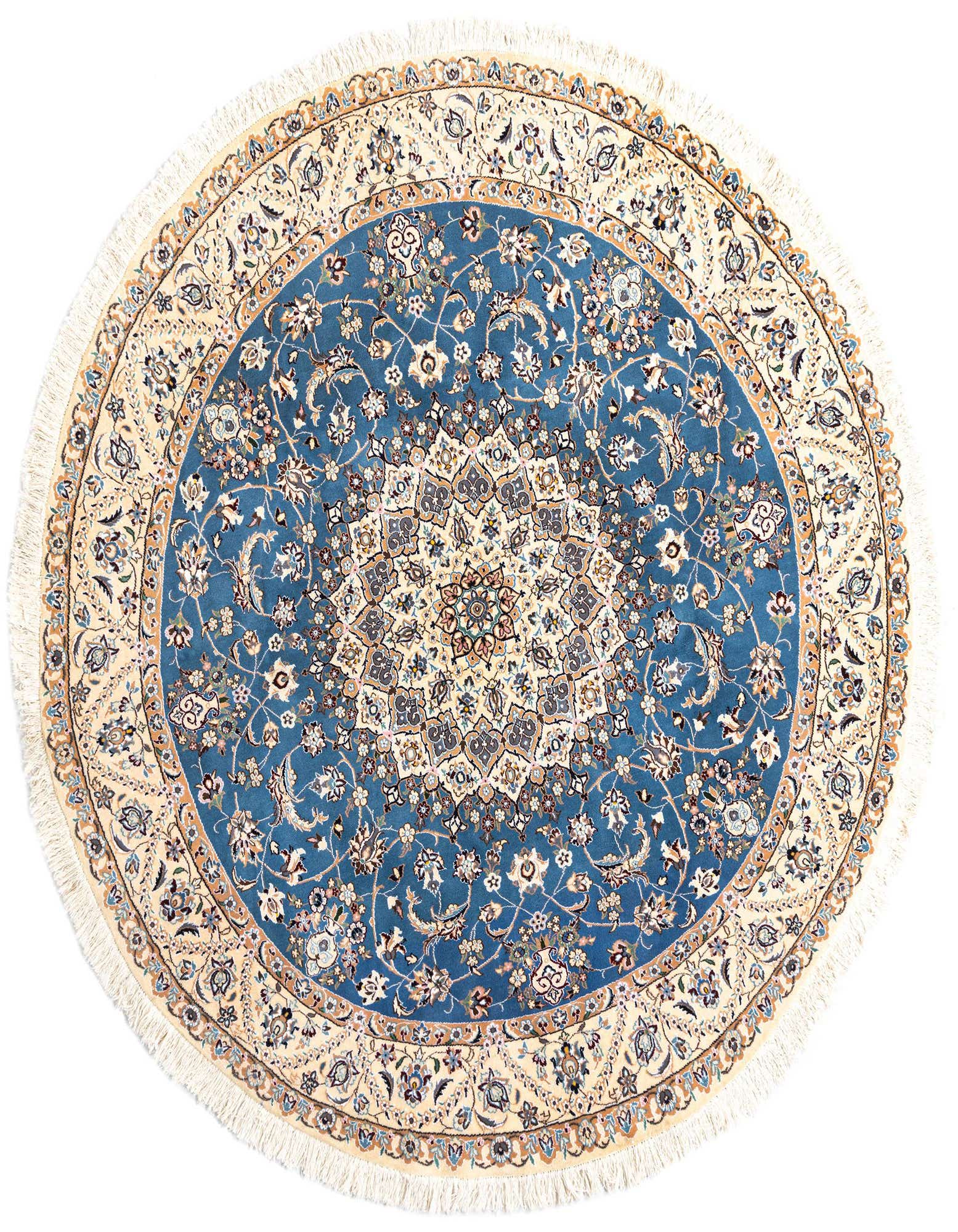 A round, handmade 6' 11 x 6' 11 blue and cream wool rug with intricate floral and medallion patterns, featuring a thin pile and fringe.
