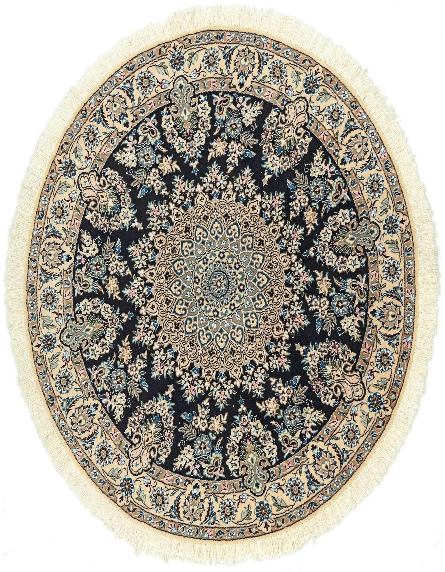 A round 4' 11 x 4' 11 Persian rug with a dark blue center and intricate floral patterns in light blue, beige, and pink, bordered by a beige band and fringe.