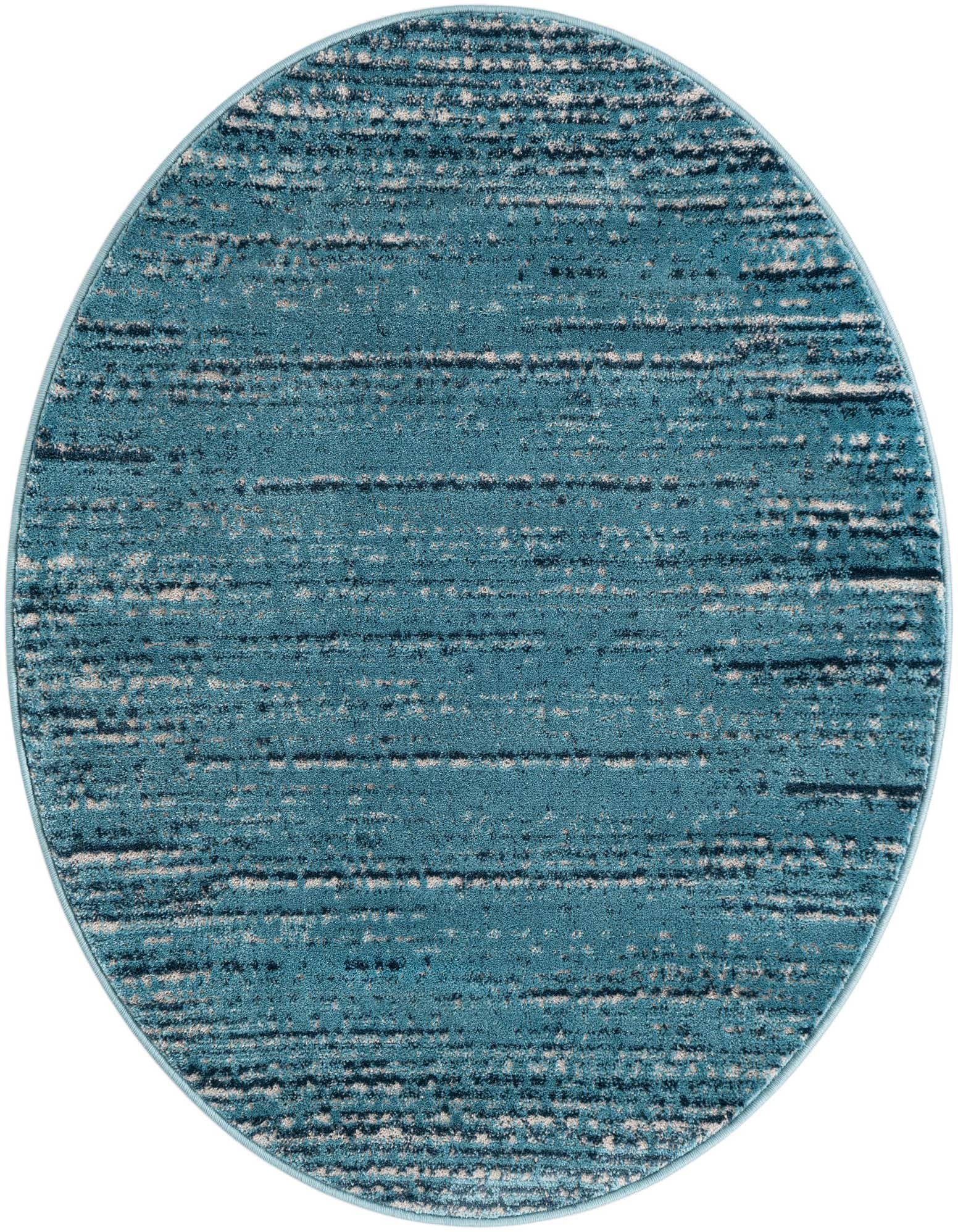 A 4' round blue area rug with a modern coastal pattern of horizontal textured lines in varying shades of blue, gray, and white.