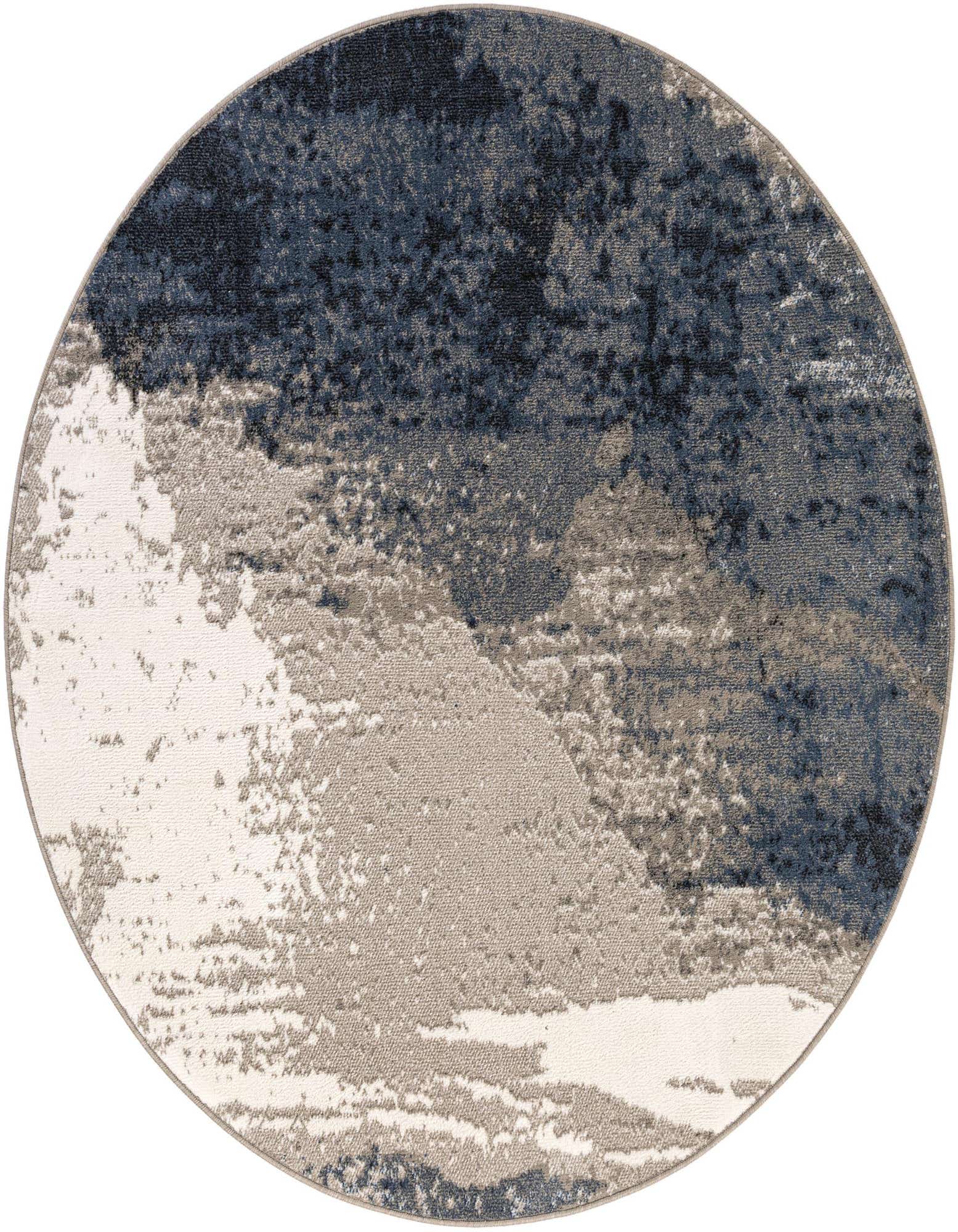 A 6' round modern abstract rug in shades of blue, grey, and white, featuring a painterly design.