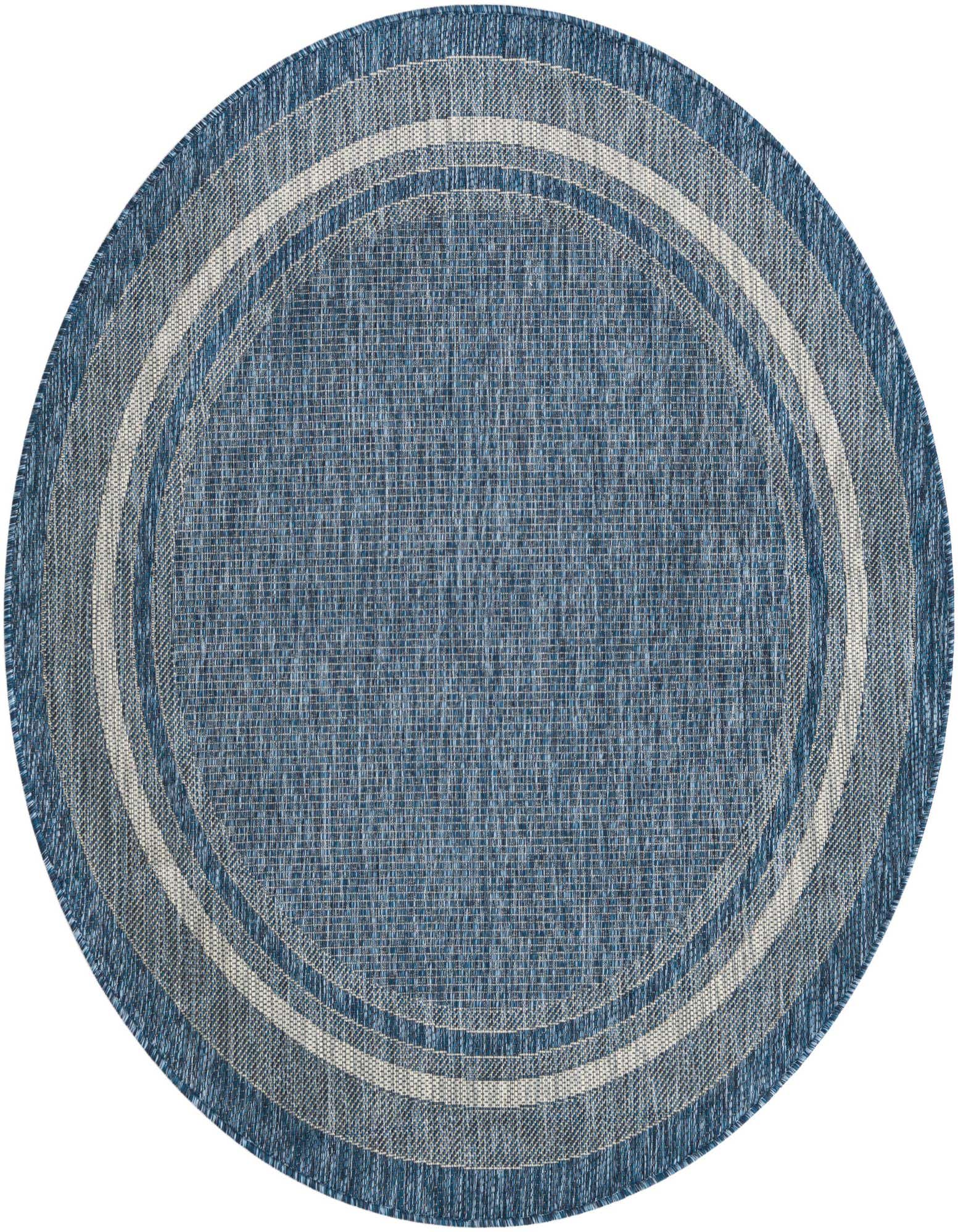 A 5'3" round blue indoor/outdoor rug with concentric light blue and off-white border stripes, showcasing its flatweave texture.