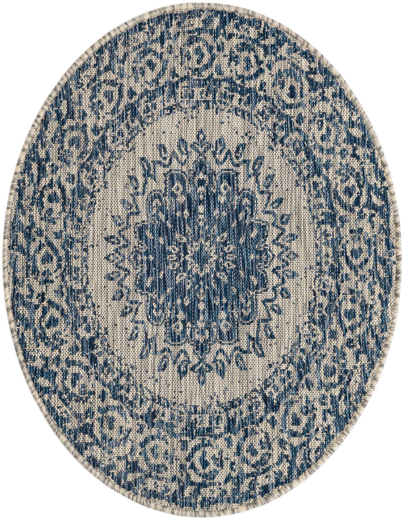 A 3' round blue and beige medallion rug featuring a distressed traditional pattern, suitable for indoor or outdoor use.