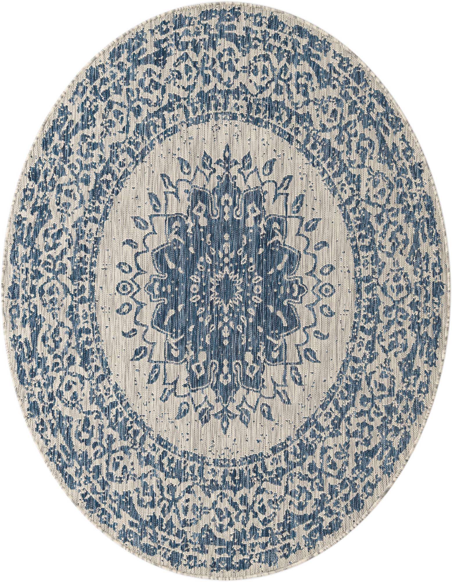 A 6' round blue and beige outdoor rug with a distressed medallion and traditional floral pattern.