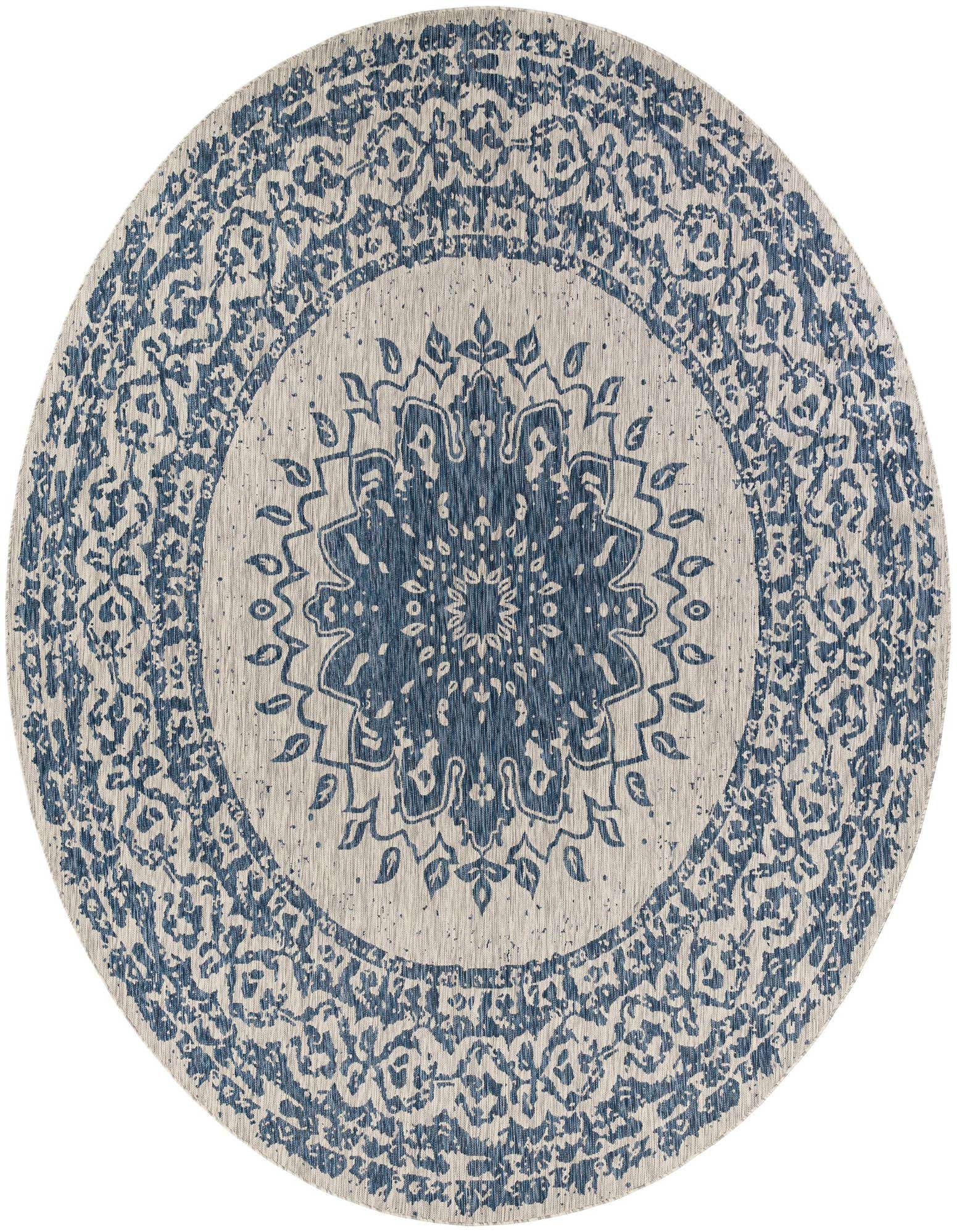 A large round blue and beige modern rug with a central medallion and intricate border pattern, suitable for indoor or outdoor use.