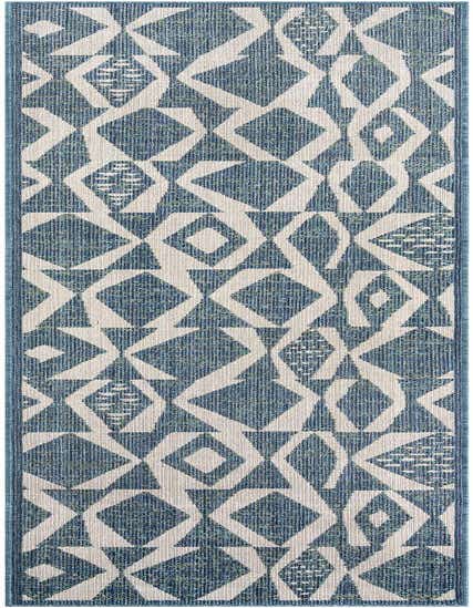 A 12 ft runner rug from the Rugs.com Baja Outdoor collection, featuring a modern geometric pattern in various shades of blue and off-white.