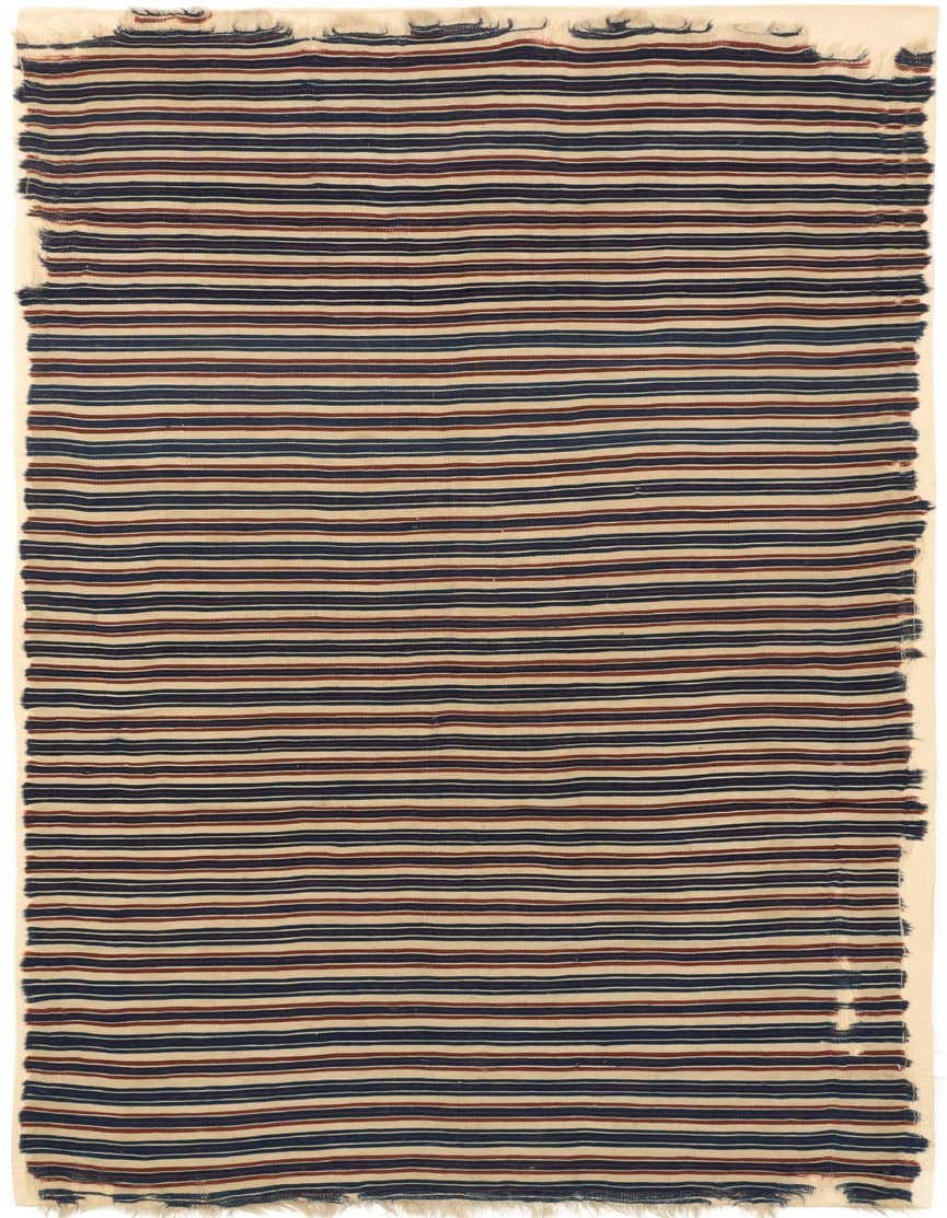 A handmade 7 Ft runner rug with alternating thin blue, red, and cream stripes, suitable for a hallway.