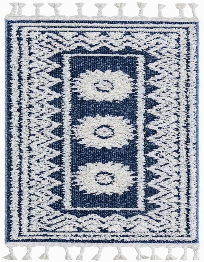 A 4 ft runner rug in blue with white Southwestern and medallion patterns, featuring braided tassels on the ends.