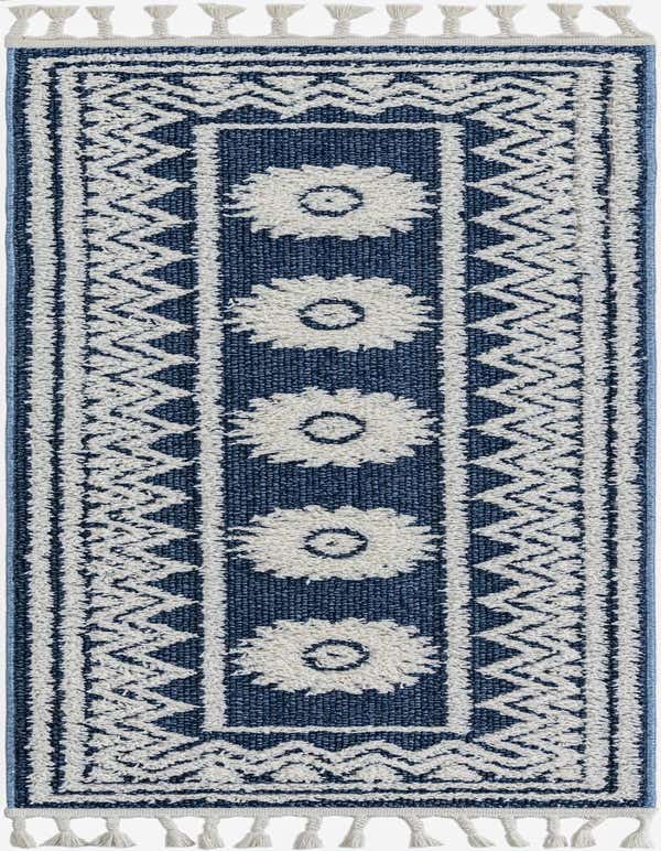 A 6 ft blue runner rug with a textured cream Southwestern pattern, tribal medallions, and decorative tassels.