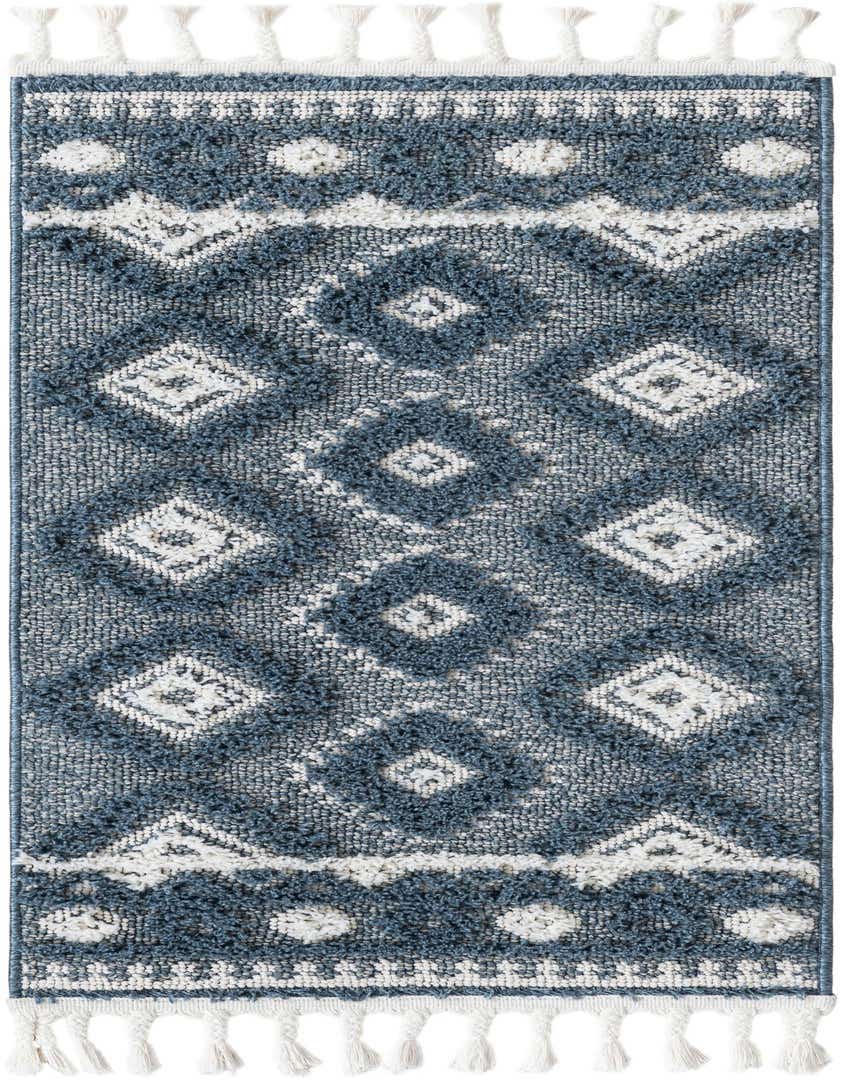 A 4 ft runner rug in shades of blue and white, featuring a Southwestern tribal pattern with diamond and trellis motifs and decorative tassels.