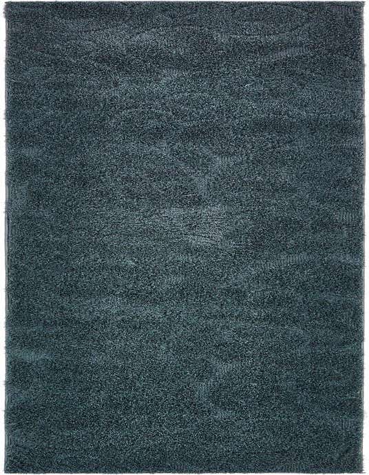 A plush 10 Ft runner rug in a deep blue hue, featuring a textured high/low pile, ideal for a hallway.