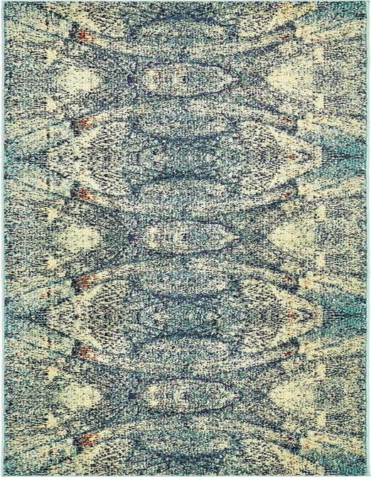 A 10 ft runner rug in shades of blue and cream with a distressed medallion pattern, ideal for a hallway.