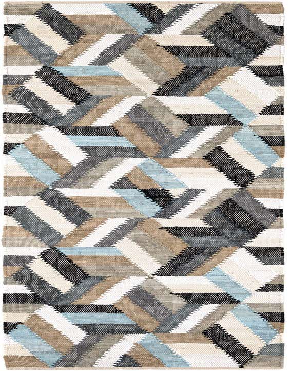 A 10 ft runner rug featuring a modern abstract geometric pattern in blues, white, black, and natural beige tones, ideal for a hallway.