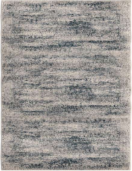 A 10 ft runner rug from the Finsbury collection, featuring a modern, distressed pattern in varying shades of blue and grey.