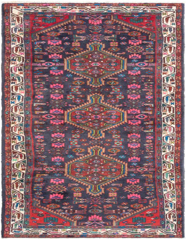 A 10 ft Hamedan runner rug with a dark blue field, featuring vibrant tribal and traditional patterns in red, pink, and light blue, perfect for a hallway.