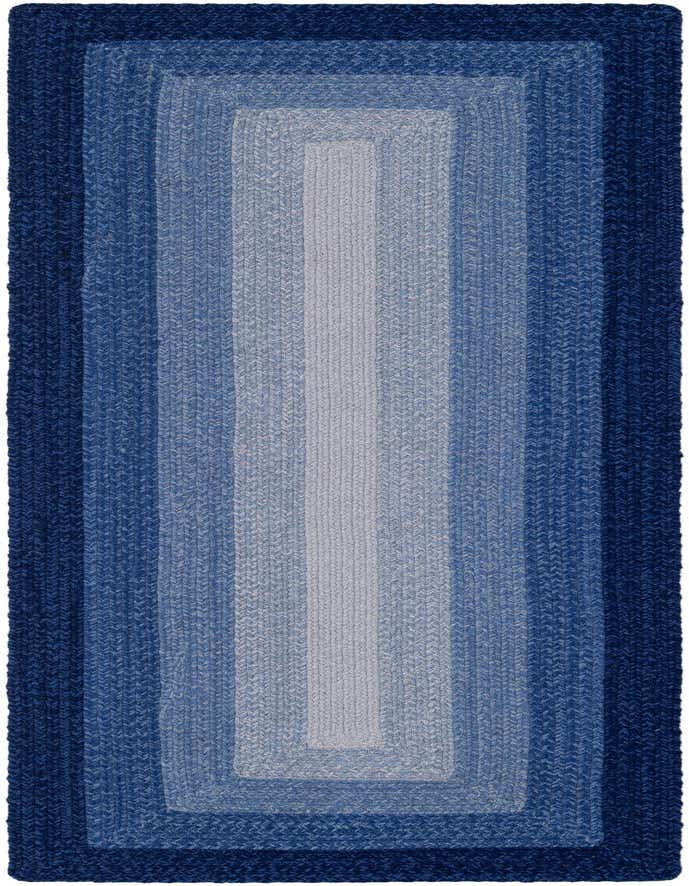A handmade 8 ft runner rug with a modern braided stripe pattern in varying shades of blue, from dark navy to light blue.