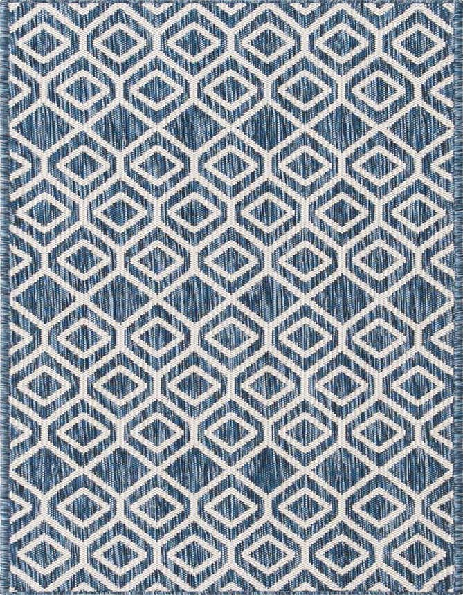 A 6 ft runner rug featuring a repeating white geometric trellis pattern over a textured blue background, suitable for a hallway or patio.