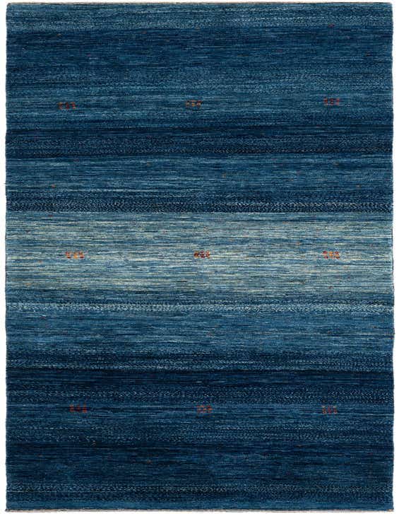 A 10 ft runner rug in varying shades of blue, featuring a textured, striped pattern with small orange accents, ideal for a hallway.