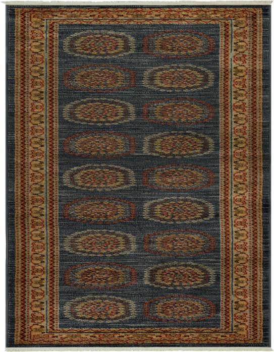 A 10 ft Kashkuli Gabbeh runner rug featuring a dark blue field with repeating medallion patterns in red, orange, and beige, framed by a detailed tribal border.