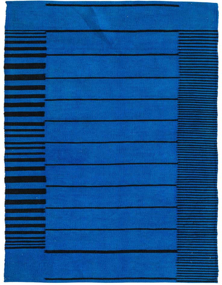 A vibrant blue 8 ft runner rug with a modern tribal pattern of horizontal black stripes and solid blocks.