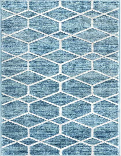 A 13 ft runner rug in shades of blue with a modern, textured geometric trellis pattern in lighter blue.