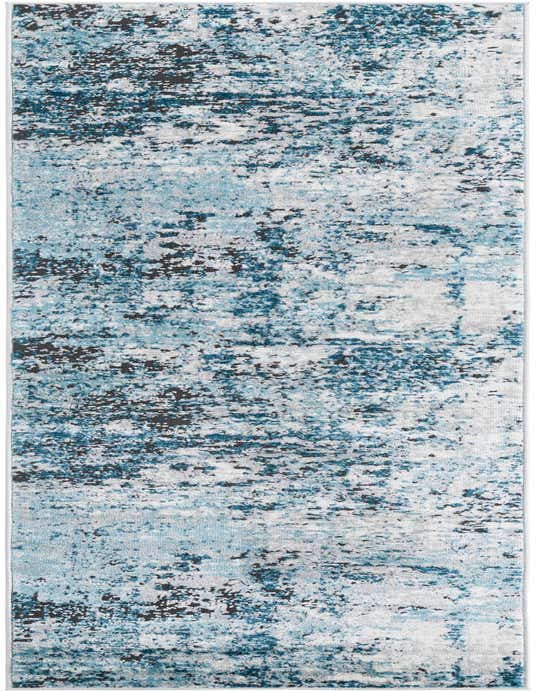 A long 8 ft runner rug with an abstract pattern in varying shades of blue, grey, and black, suitable for a hallway.