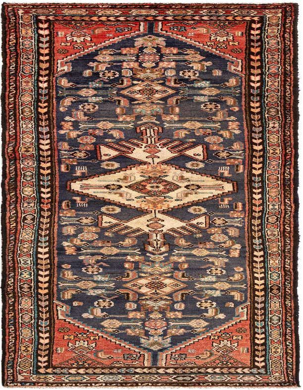 A long, narrow Mehraban runner rug featuring a traditional Persian tribal pattern in deep blues, red, and cream, ideal for a hallway.