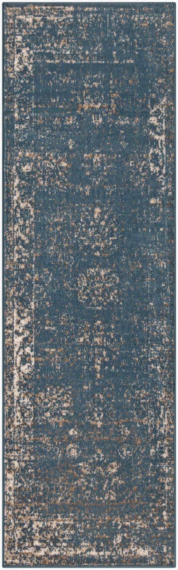 A 7 ft runner rug in shades of blue with a distressed bohemian medallion pattern and light beige accents.