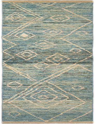 A 16 ft blue wool runner rug with a tribal geometric pattern in cream, ideal for a hallway.