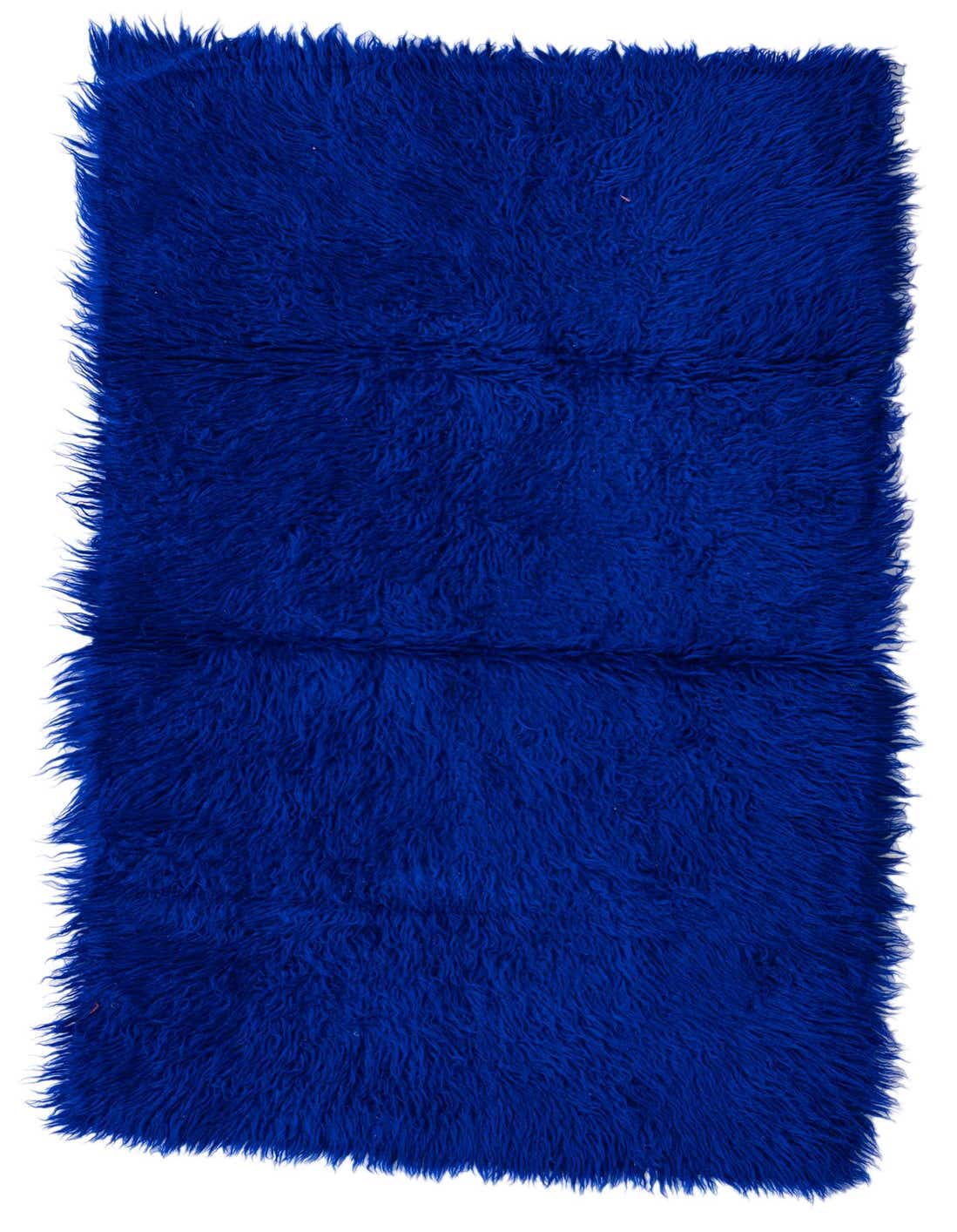 A vibrant 5 ft blue shag runner rug made of wool, featuring a plush, textured pile, ideal for a hallway.