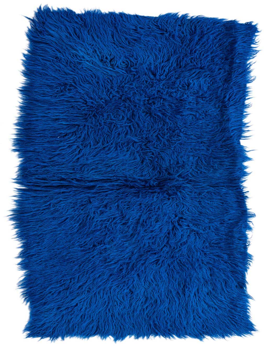 A vibrant blue 4 ft runner rug with a plush shag pile, perfect for adding a pop of color to a hallway.