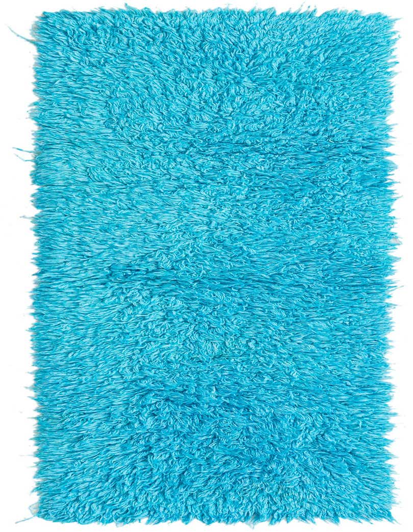 A vibrant blue 7 ft shag runner rug with a plush, textured pile, ideal for a hallway.