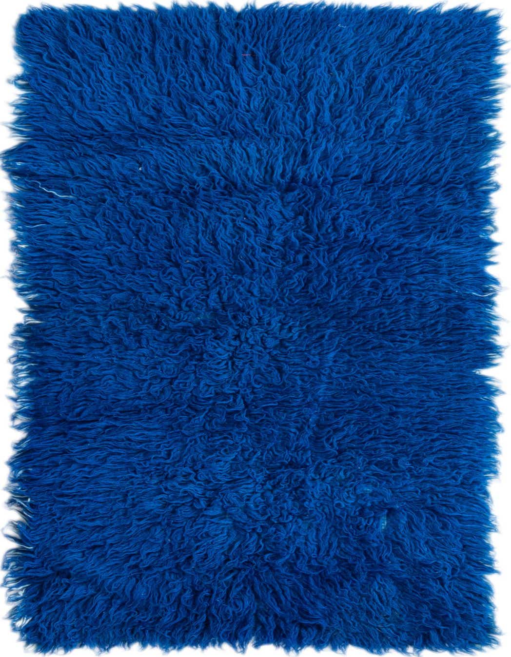 A vibrant blue 4 ft runner rug with a plush shag pile, perfect for adding warmth to a hallway.