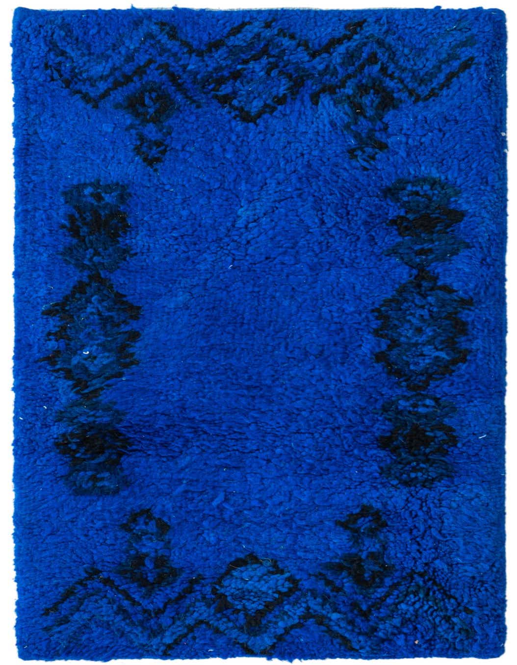 A vibrant blue 4 ft runner rug with a plush shag pile, featuring abstract black tribal patterns along its borders.