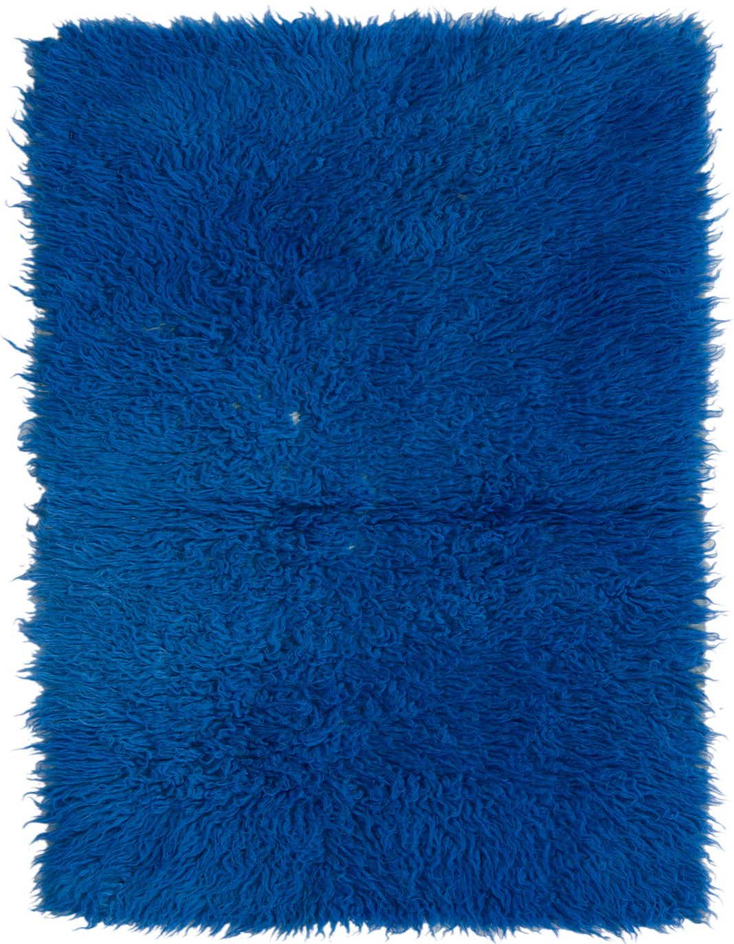 A vibrant blue 4 ft runner rug with a plush, shaggy texture, ideal for adding color to a hallway.