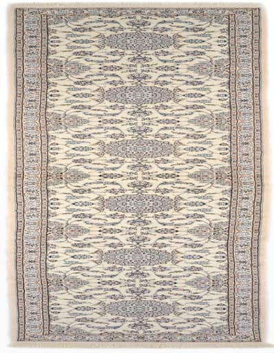 A long 19 ft runner rug from the Rugs.com Nain collection, featuring a cream background with intricate blue and brown Persian floral patterns, and fringed ends.