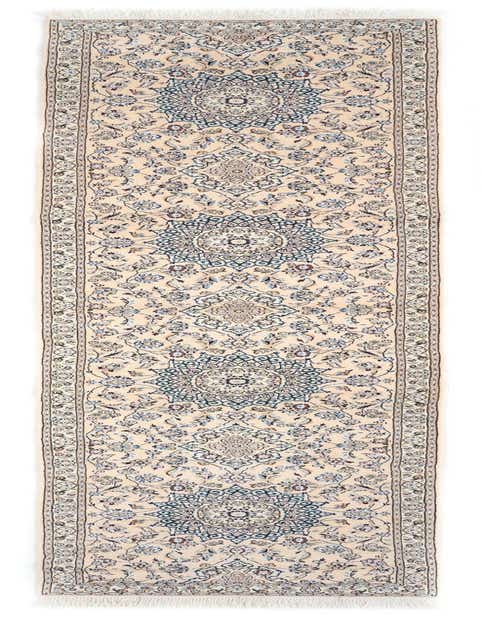 A 14 ft runner rug with an intricate Persian pattern in shades of blue and cream, perfect for a hallway.