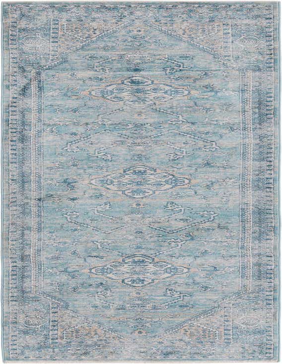 A 10 ft Newport runner rug in blues with a traditional medallion and tribal pattern, ideal for a hallway.