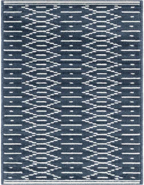 A long 8 ft runner rug featuring a modern geometric pattern of white diamonds and dashes on a deep blue background, ideal for a hallway.