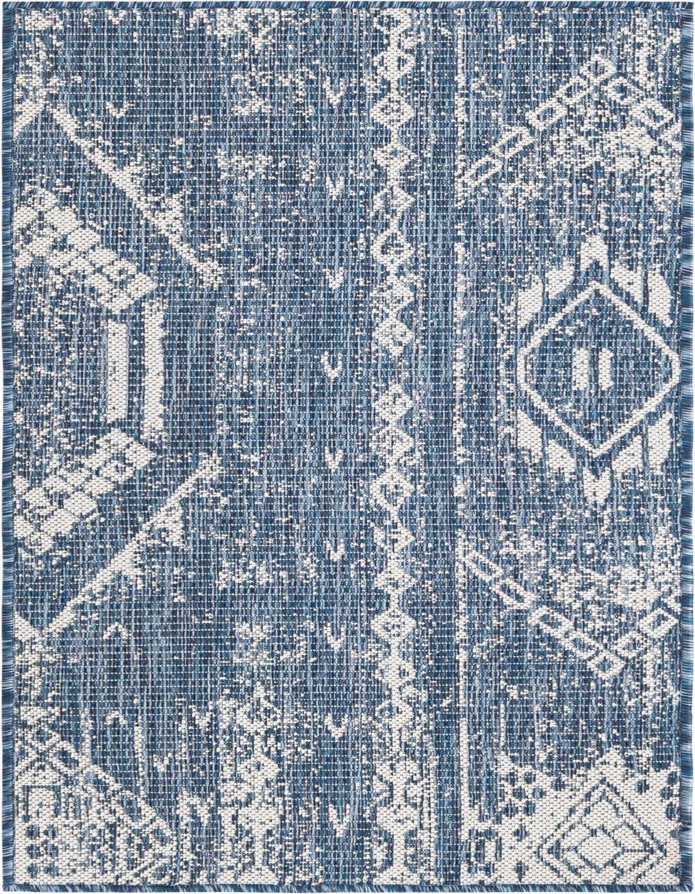 A 4 ft runner rug in blues with a modern geometric pattern and textured flatweave, suitable for indoor/outdoor use.