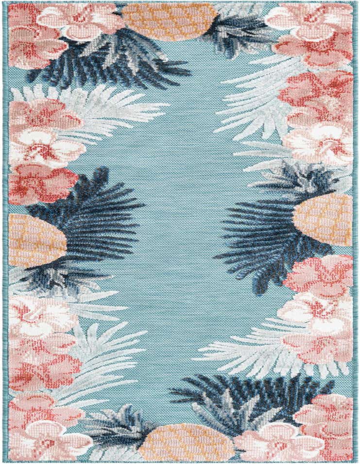 A 6 ft runner rug with a vibrant blue background, featuring a border of pink flowers, green and white palm leaves, and pineapples, ideal for a hallway or patio.